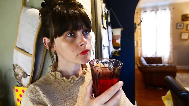 Sydney Harwin as taboo mommy sipping red wine, seductive gaze