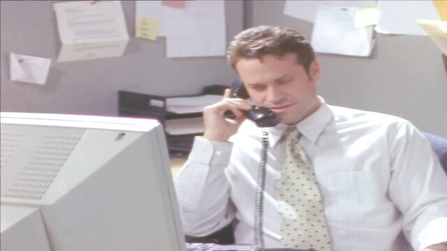 Kim Yates in office on phone, white shirt tie, erotic confessions