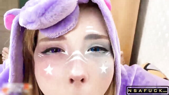 Purple bunny hood cosplay girl with kawaii makeup closeup face