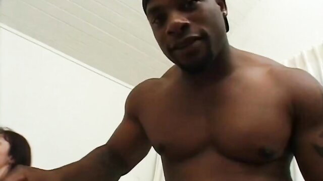 Daniella Rush with muscular black man in interracial sex scene