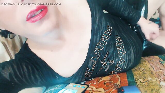 Magnificent femboy sissy in sexy top with bold red lips selfie