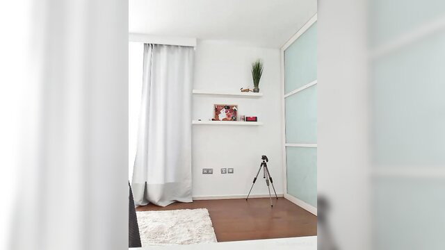 Amateur blondie in white lingerie teases big ass on bed solo