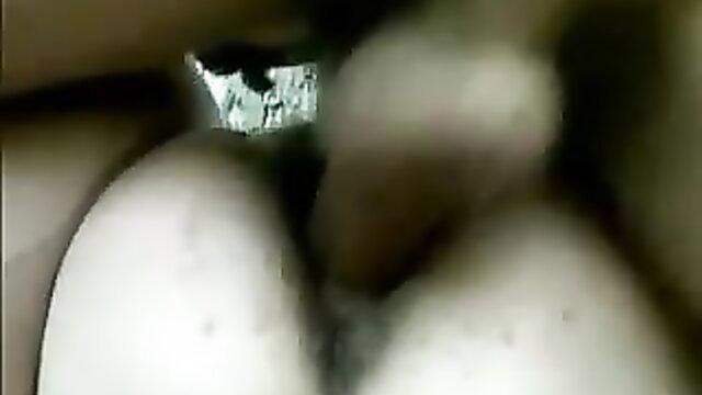 Blurry closeup of milf wife's white thighs and foil condom packet in outdoor sex