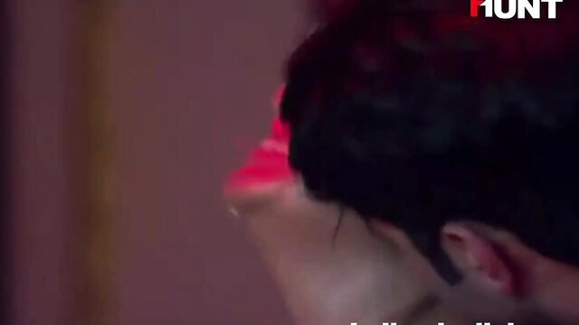 Asian woman profile view closeup in red lighting Hunt Hindi porn series