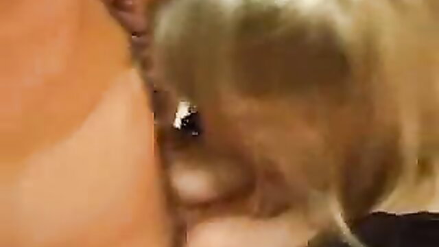 Blonde mature woman closeup eye and lips in steamy threesome