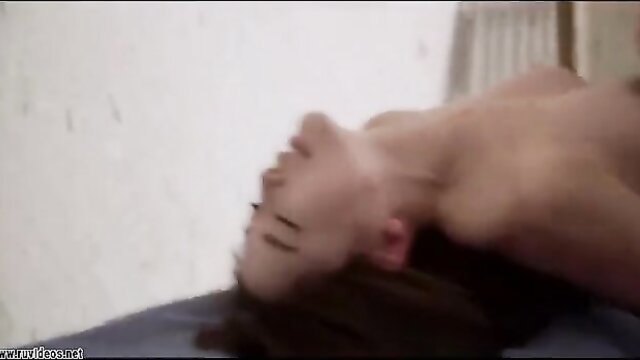 Korean woman nude on bed, neck arched back in ecstasy, amateur sex scene