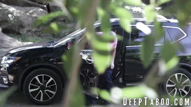 Emma Jade bends over black SUV as Charles Dera grabs her ass outdoors