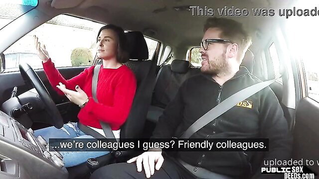 Busty brunette in red sweater with colleague in car, friendly vibes