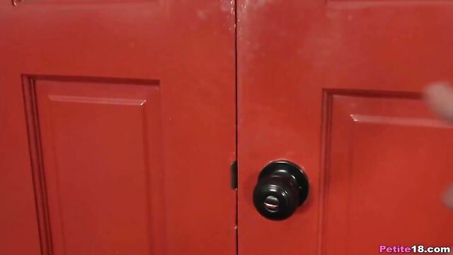 Coco Lovelock closeup on red door black doorknob adult thumbnail