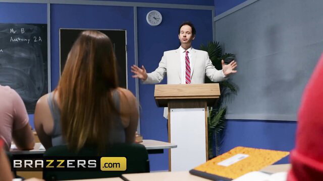 Sofi Ryan in class with teacher at podium, busty schoolgirl preview