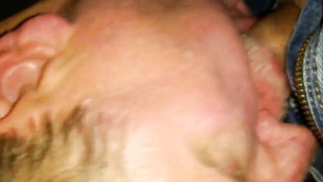 Blurry closeup of redhead sucking dick in Harley gear, explicit oral