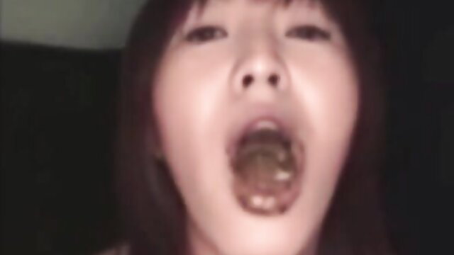 Asian beauty with open mouth showing tongue in scat tease