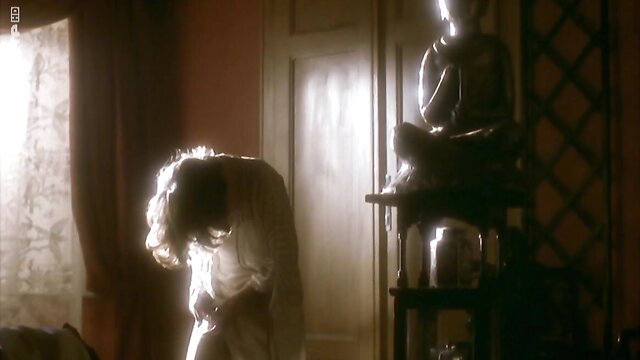 Irene Jacob in sheer nightgown, elegant silhouette softcore pose