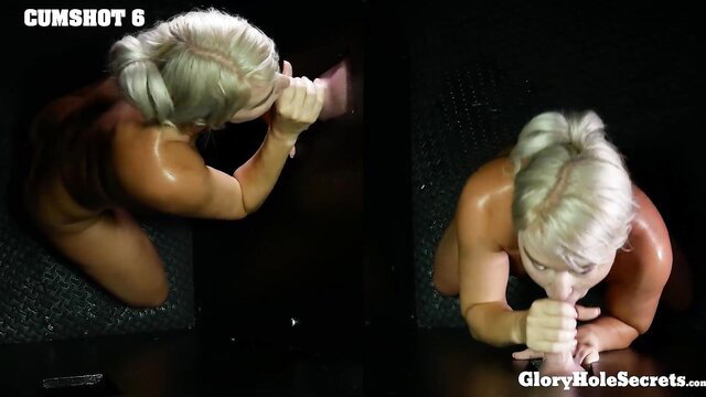 Buff blonde milf on knees at gloryhole swallows massive cumshot