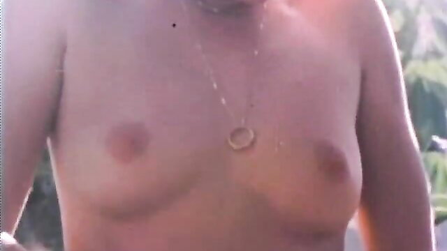 Loni Sanders topless with gold nipple ring, Mei Lin retro porn thumbnail