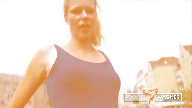 Blonde Claudia Swa in tank top, hot outdoor tease by Wolf Wagner