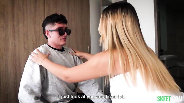 Victoria Love touches young guy in grey hoodie, teasing intimacy