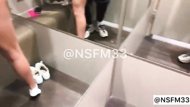 Hot chick flashing ass & feet in store changing room mirror