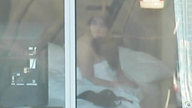 Sweet Asian cutie nude in bed, solo apartment tease