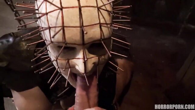 Pinhead mask MILF licks huge cock in extreme BDSM horror porn