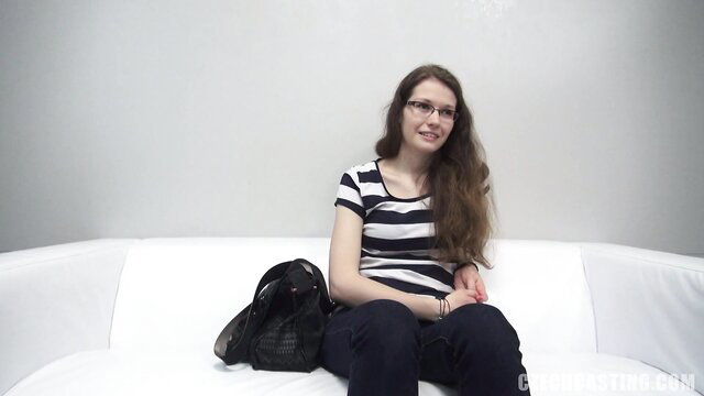 Cute amateur Tereza Grande with glasses on couch