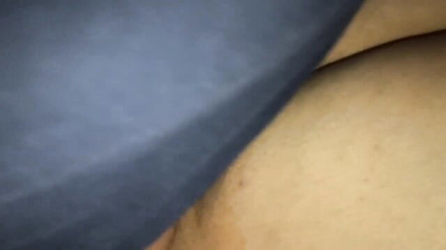 50yo mature Latina granny's big pale ass in tight blue shorts closeup