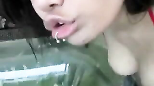 Annie Cruz closeup lips and tongue piercings in squirtjuice scene