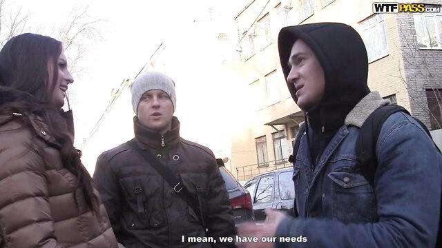 Gabriella in public street talk with guys, winter clothes