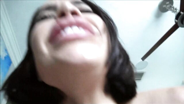 Victoria June smiling closeup in stepmom porn scene