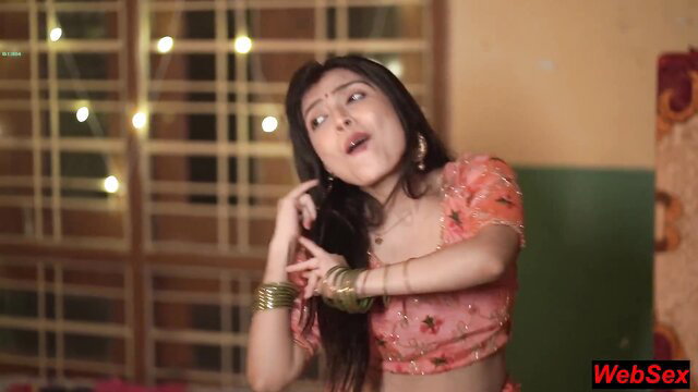 Hot Indian Desi girl in pink saree blouse, seductive pose and expression