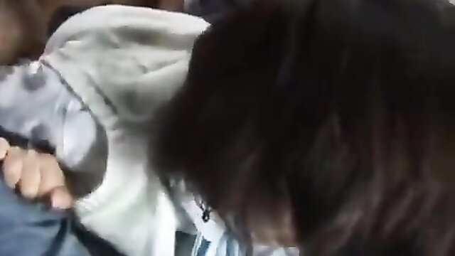 Japanese man in uniform groping woman's tits in JAV scene