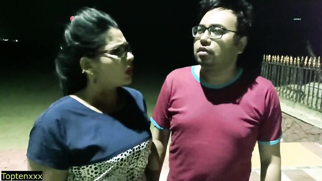 Hot Indian GF in tight dress chats intimately with guy at night outdoors