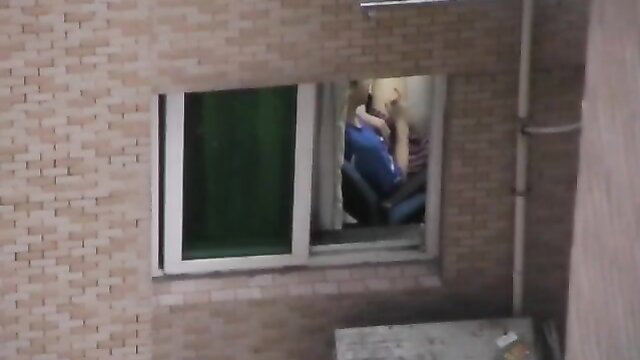 Insatiable Asian milks cock from window in blue top, caught peeking