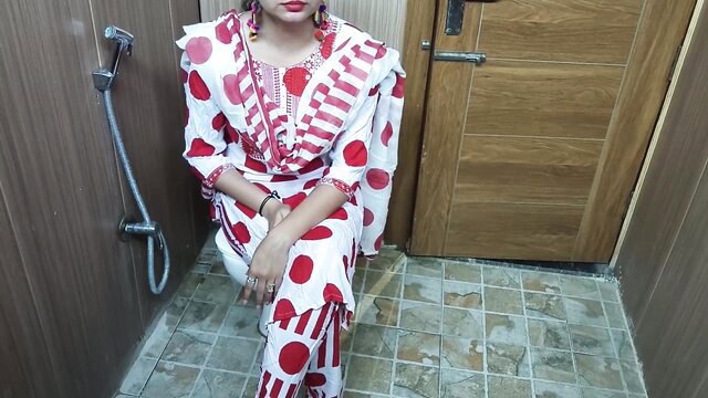 Desi stepmom in red polka dot saree sits in bathroom, naughty Hindi taboo tease