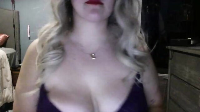 missclaranoir blonde busty cam girl in deep cleavage lingerie