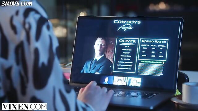 Woman viewing Cowboys & Aliens porn on laptop with Oliver actor screenshot
