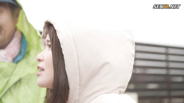 Umi Natsukawa hooded in rain with man, shocking tent cuckold tease