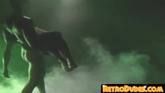 Retro muscular hunk carries nude twink for wet anal pounding