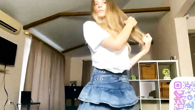 FruityXo blonde teen in white tee and frilly denim skirt poses playfully