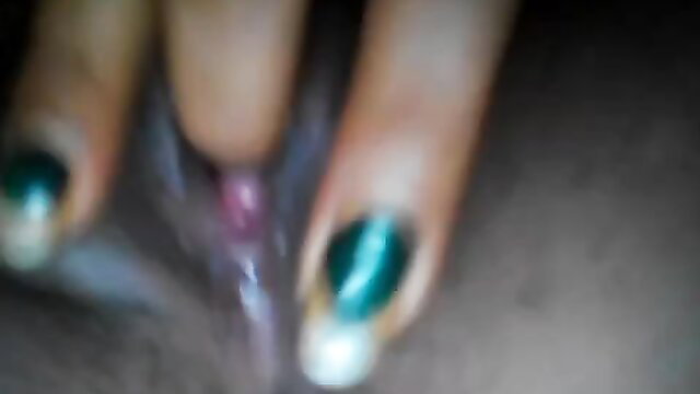 Cute Indian girl fingering shaved pussy closeup with green nails