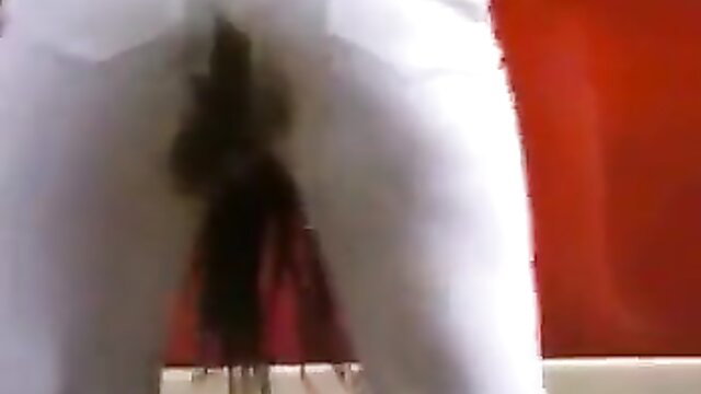 Marina in white pants public messing, visible wet crotch stain