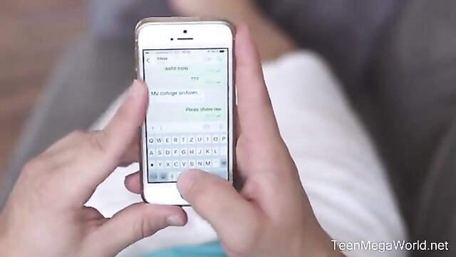 Teen girl texts on iPhone 5, white dress, over shoulder POV