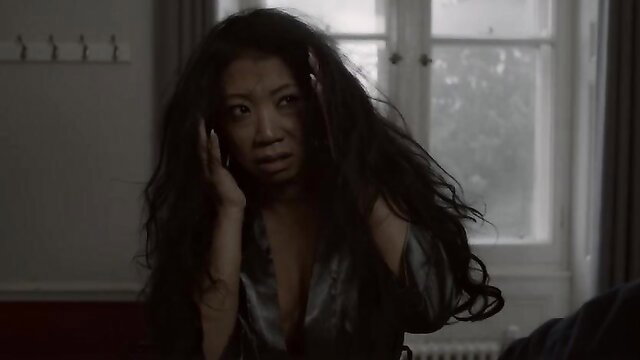 Chrissie Wunna nude tits in silky robe, scared expression - The Elevator (2023)