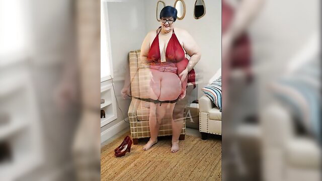 Curvy BBW in red lingerie posing seductively on chair