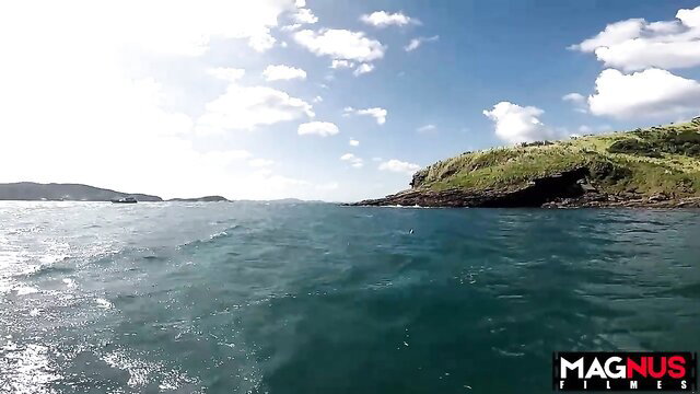 Brazilian redhead girlie outdoors by turquoise sea cliff - Magnus Filmes