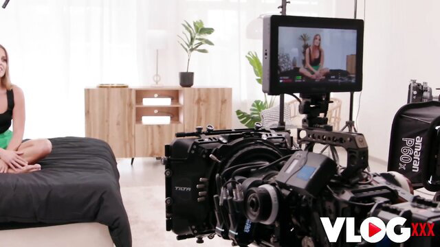 Eveline Dellai in sexy tank top on bed adult vlog shoot