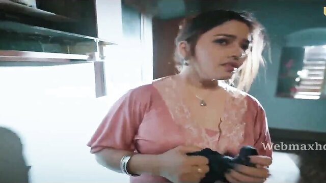 Indian beauty in pink lace top holding panties, seductive Ullu series thumbnail