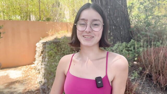 Penelope 19yo Paris cosmetics girl smiling outdoors in pink top