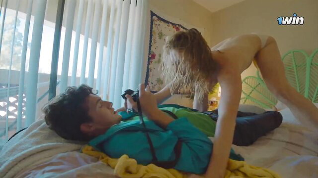 Blonde teen rides nude on young man's face in explicit 2024 scene