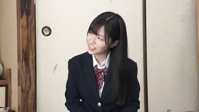 Cute Japanese stepsister in school uniform smiling shyly